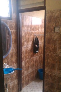 My Bathroom. I have a mirror! I don't have a plug for my sink though so I use the container there so I can wash my face etc.